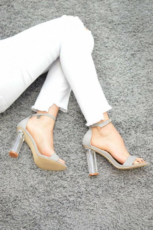 Sandals with toggle and transparent heels
